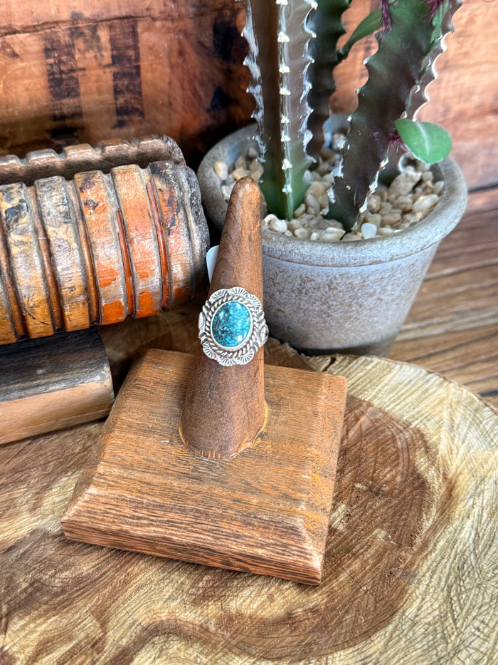 Turquoise oval in sterling silver spiderweb design ring, wide engraved band