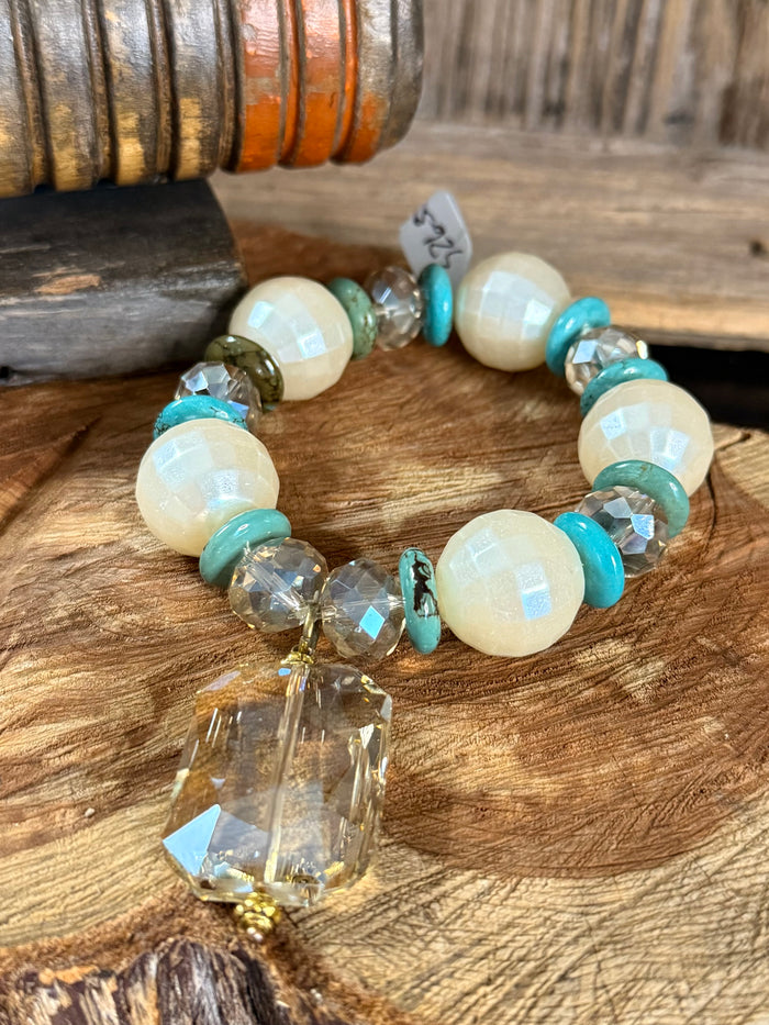 Stretch bracelet with white opal pearl beads, turquoise beads, faceted crystal drop charm