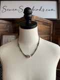Sterling silver necklace with turquoise beads and running horse pendant, bead chain