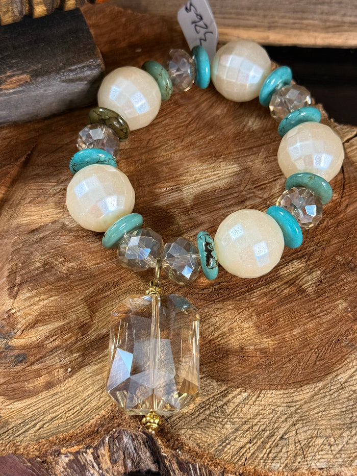 Turquoise and pearl stretch bracelet with rhinestone beads and crystal teardrop charm