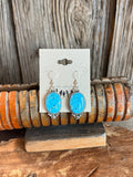 Turquoise oval fishhook earrings with sterling silver scalloped bezel