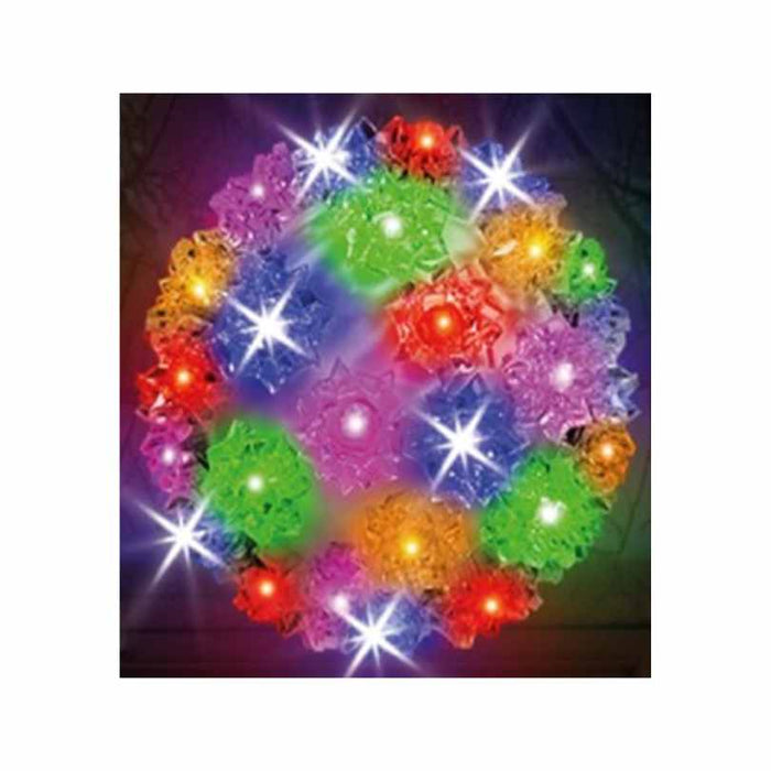 The 5.5-Inch Crystal Sphere LED Light – Multi from Available for Pick-Up & Delivery features spiked translucent plastic and bright multicolored LEDs, making it a striking choice for holiday décor against dark backgrounds.