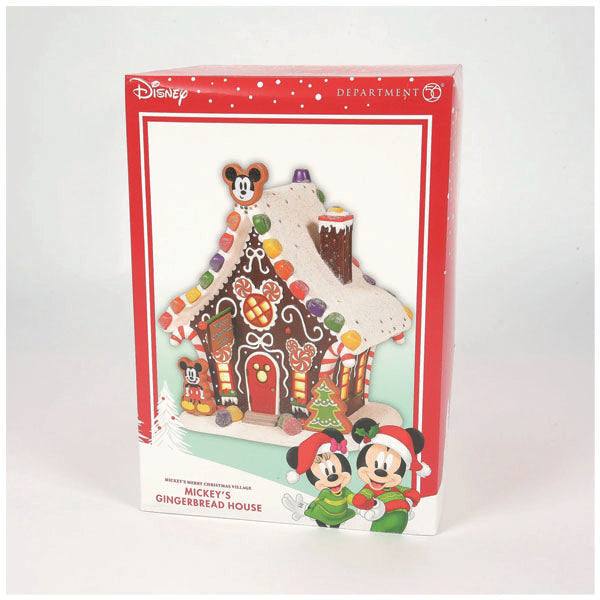 The Department 56 - Mickey’s Gingerbread House kit is a festive treat featuring Disneys Mickey and Minnie Mouse, perfect for holiday décor. With colorful candies and the iconic duo in holiday attire, it adds cheer to any setting. Available for pick-up & delivery.
