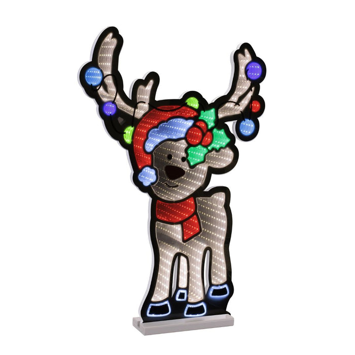 The Infinity Light – Reindeer - 24" from Available for Pick-Up & Delivery features a charming reindeer in a red scarf and Santa hat, with ornaments and holly on its antlers, glowing with white and colored lights on a white base.