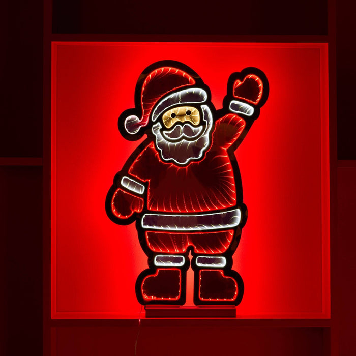 The Infinity Light – Waving Santa – 23” by Available for Pick-Up & Delivery features a neon sign of Santa Claus on a vibrant red background, depicting him in his iconic outfit with a glowing outline and one hand raised—perfect festive decor to capture the holiday spirit.