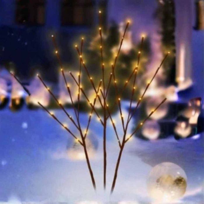The Lit Branch - 30" (3-Pack) in warm white with brown stems creates a soft glow in snow, adding festive charm to any indoor or outdoor space. Available for Pick-up & Delivery. Perfect for cozy winter decorating.