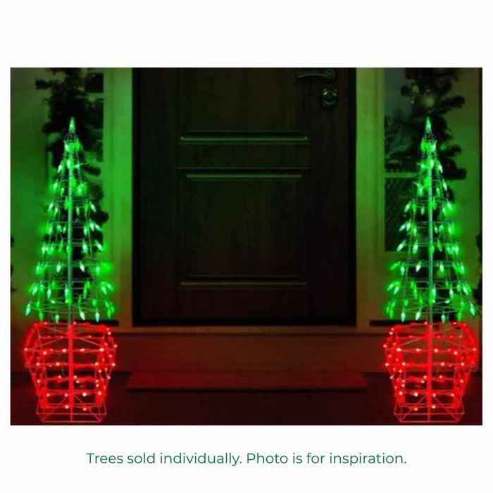 Two Lit Wire Christmas Trees - 48" (Available for Pick-Up & Delivery) with green LED lights and red bases stand illuminated on either side of a front door at night. Sold individually; photo shown for outdoor decor inspiration.