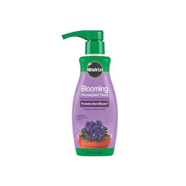 Miracle-Gro® Blooming Houseplant Food, 8 oz., features a nutrient-rich formula and a green pump bottle with a purple label and blooming plant image to support vibrant indoor blooms. Brand: All Delivery Options.