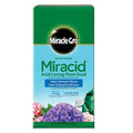 Front of a Miracle-Gro® Miracid® 4 lb. box from All Delivery Options, featuring flowers and a watering can. Text highlights how this acid-loving plant food helps plants achieve vibrant color and beautiful blooms. Net weight: 4 lb (1.81 kg).
