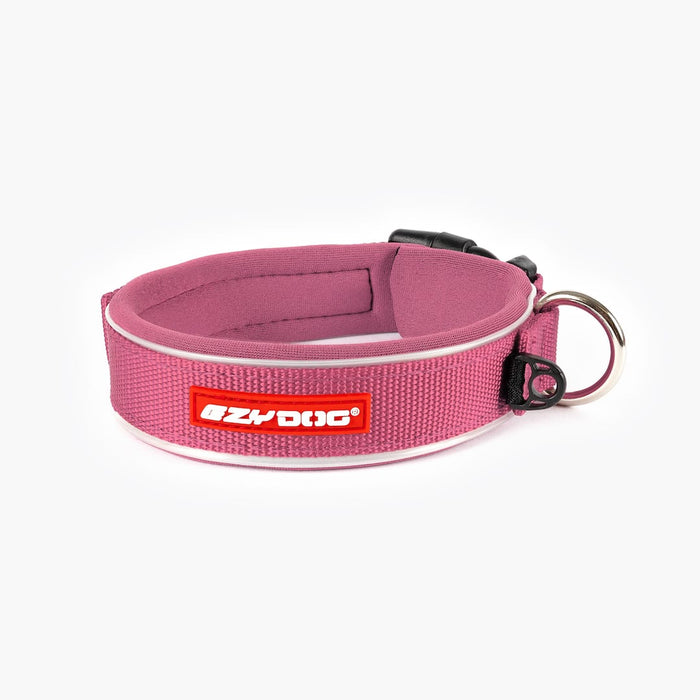 A pink neoprene and nylon dog collar with a black plastic buckle and a label that reads 'EzyDog'.