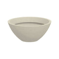 The Pick-Up & Local Delivery Only Planter - Drizzle - Off White - Low - 22-inch features a round, light beige design with a subtle textured exterior, ideal for indoor/outdoor use, shown at an angle against a plain white background.