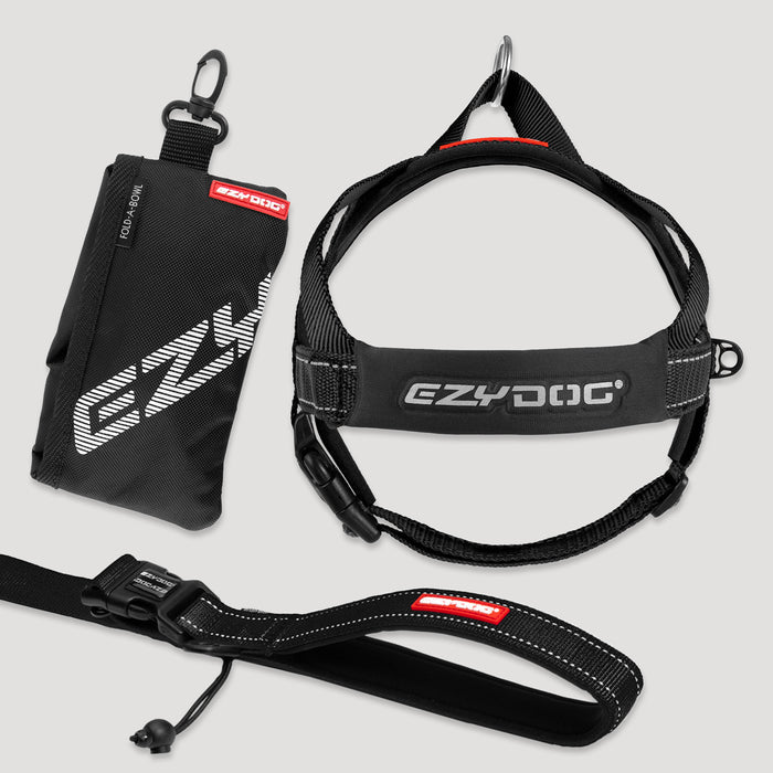 EzyDog dog harness, leash, and pouch on a light gray background