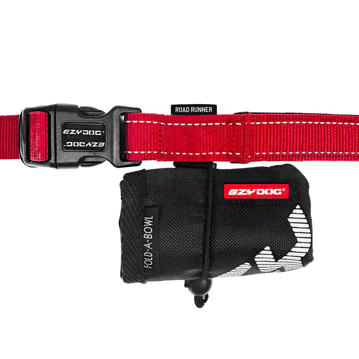 Red dog collar with black clip, fold a bowl, and 'EzyDog' branding on a white background