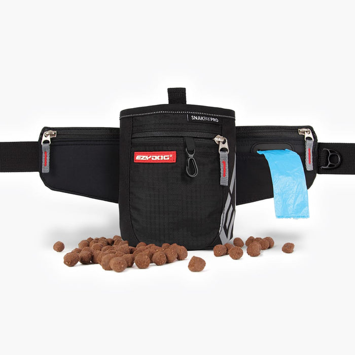 Black waist bag with a red label, blue plastic bag, and dog treats on a white background