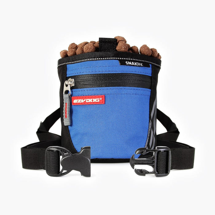 Blue dog training treat pouch with black strap and red label on a white background