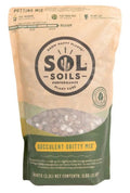 A 2 Qt. bag of Succulent Gritty Mix from Available for Pick-Up & Delivery, in a tan and green package with a clear window, offers excellent drainage for succulents as a performance plant care product.