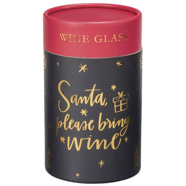 A cylindrical gift box features a red lid labeled WINE GLASS and a black body with metallic gold text that reads, Santa, please bring wine, alongside star and present icons. Its perfect for holding a holiday drink in style. Brand: Available for Pick-Up & Delivery. Product: Wine Glass – Santa, Please Bring Wine.