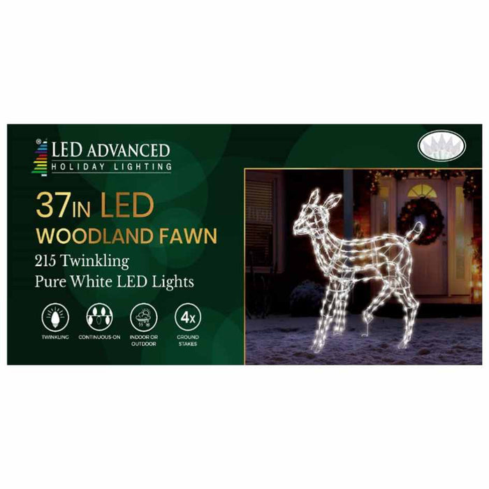 The Woodland Fawn - LED Outdoor Decor - 37" from Available for Pickup & Delivery glows with 215 pure white lights, making it a stunning, weather-resistant holiday accent for your lawn, beautifully displayed on snowy ground at night.