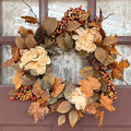 The door is adorned with the Wreath – Fall Florals – 20” by Available for Pick-Up & Delivery, showcasing beige flowers, pinecones, leaves in brown, orange, and red with yellow and red berry clusters. Lace curtains peek through a glass pane to enhance its natural charm.