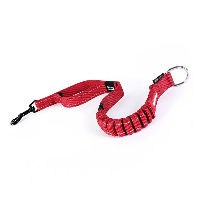 A red EzyDog Zero Shock Extension leash with a shock-absorbing feature and a traffic control handle.